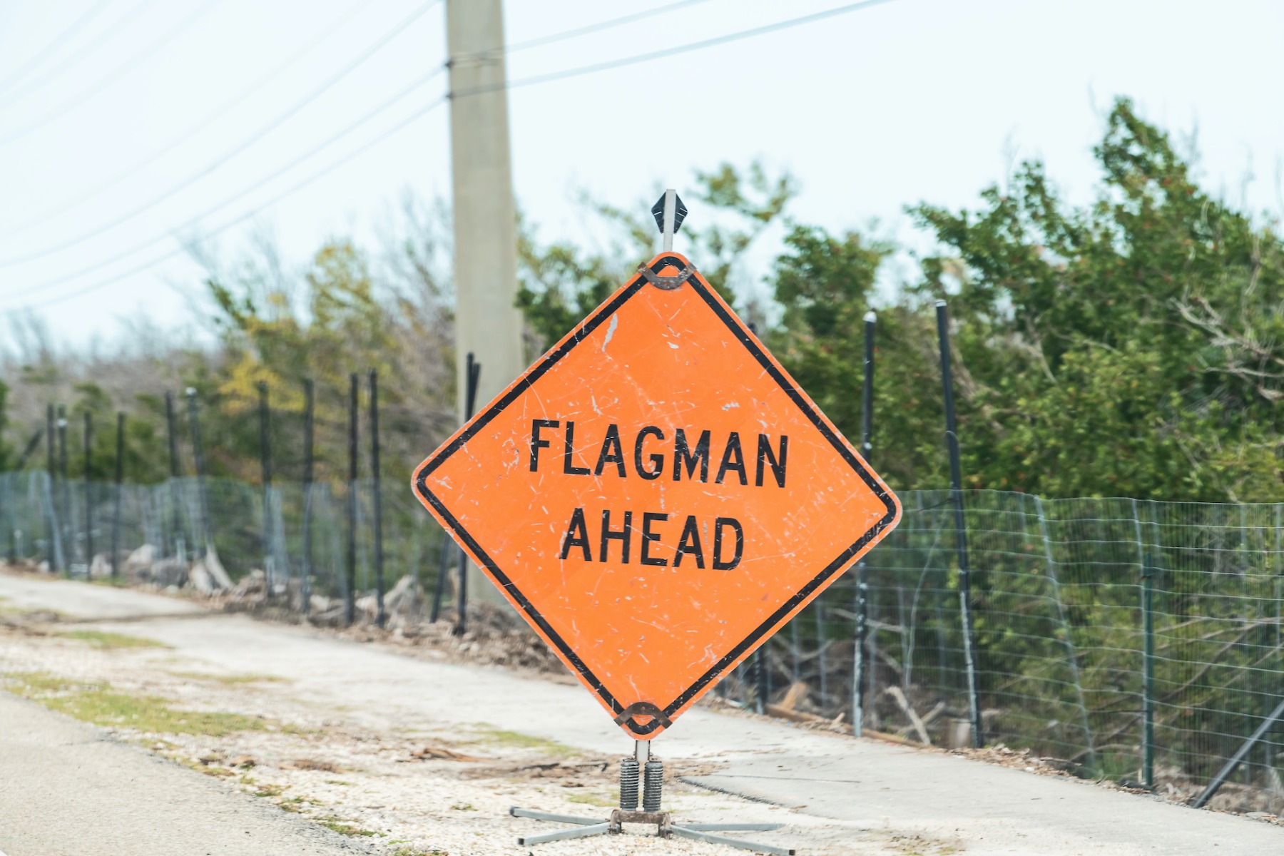 worker ahead sign